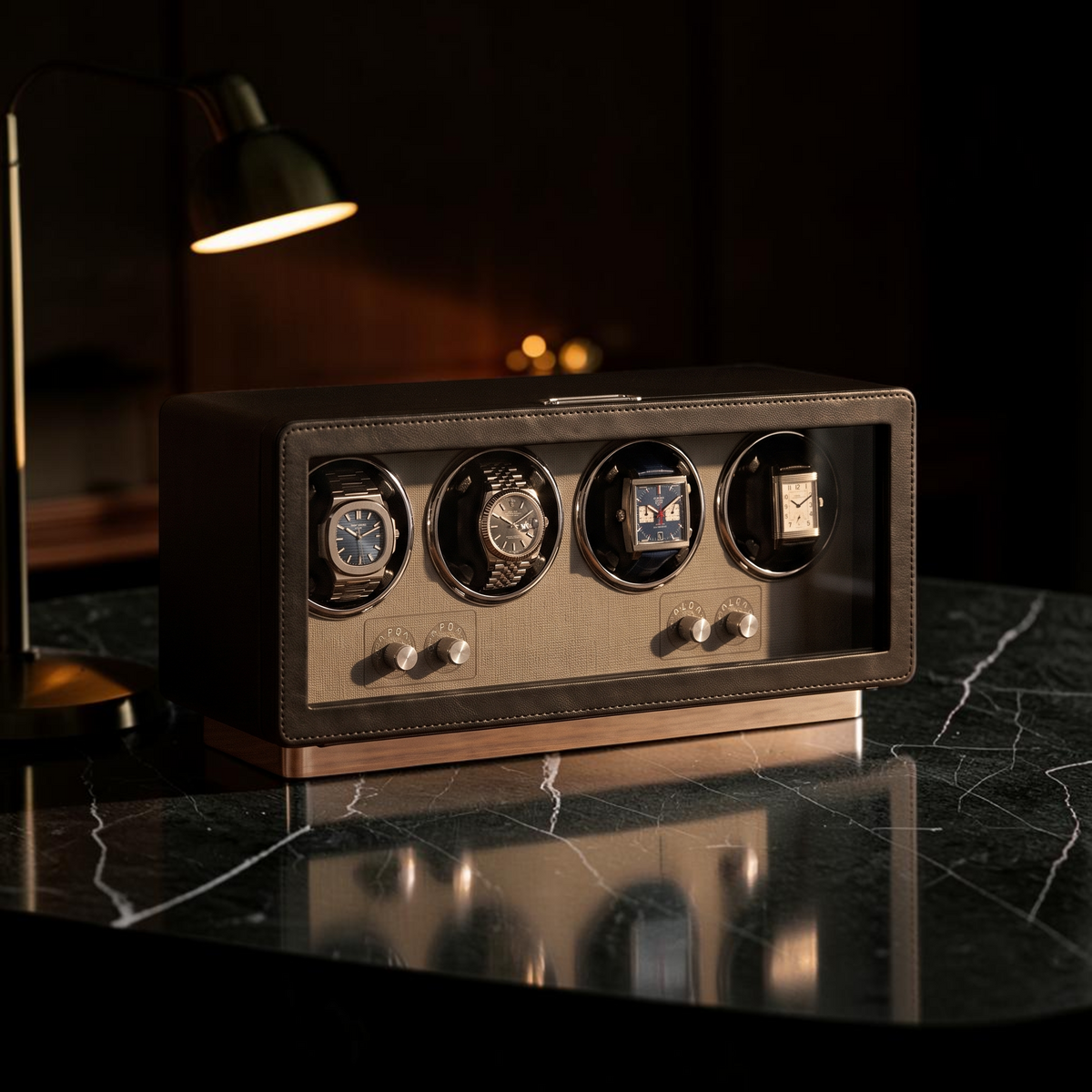 The Savile 4 watch winder on a marble surface