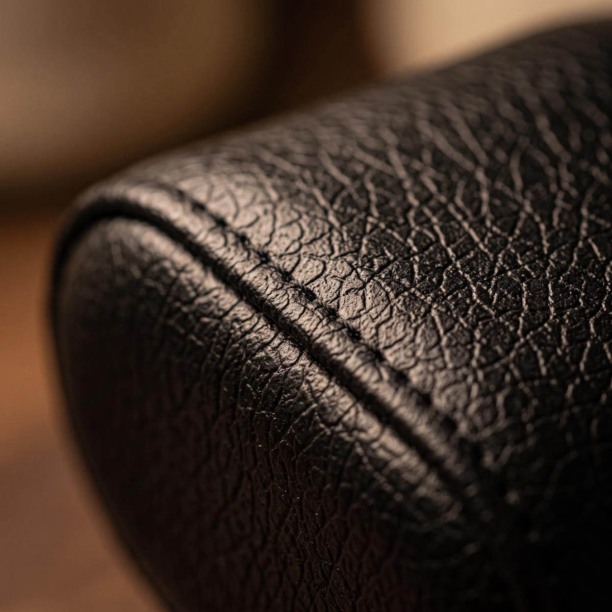 Watch winder cushion in textured black finish with stitching